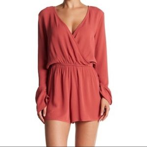 Love Stitch long sleeve wrap front romper